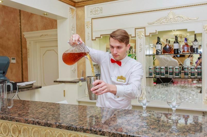 Boutique Hotel Buta Minsk Exterior photo A bartender at work