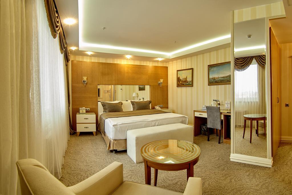 Boutique Hotel Buta Minsk Exterior photo A room at the hotel