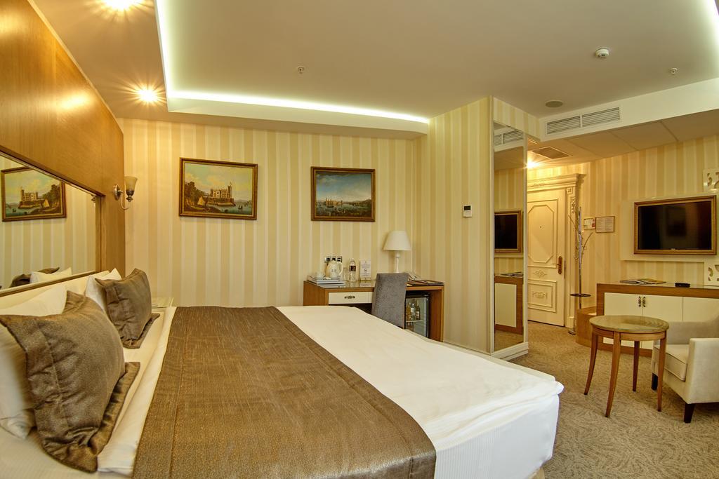Boutique Hotel Buta Minsk Exterior photo A room at the hotel