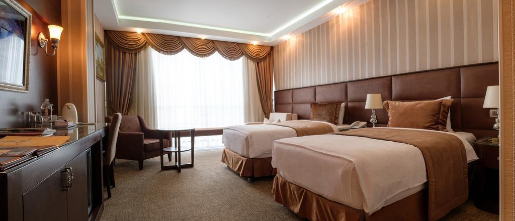Boutique Hotel Buta Minsk Exterior photo A room at the hotel