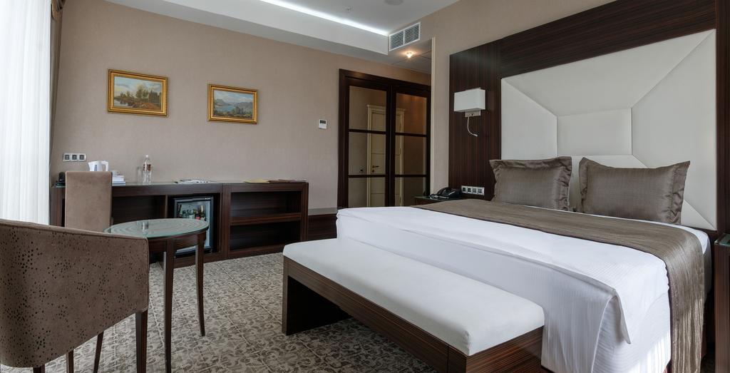 Boutique Hotel Buta Minsk Exterior photo A room at the hotel