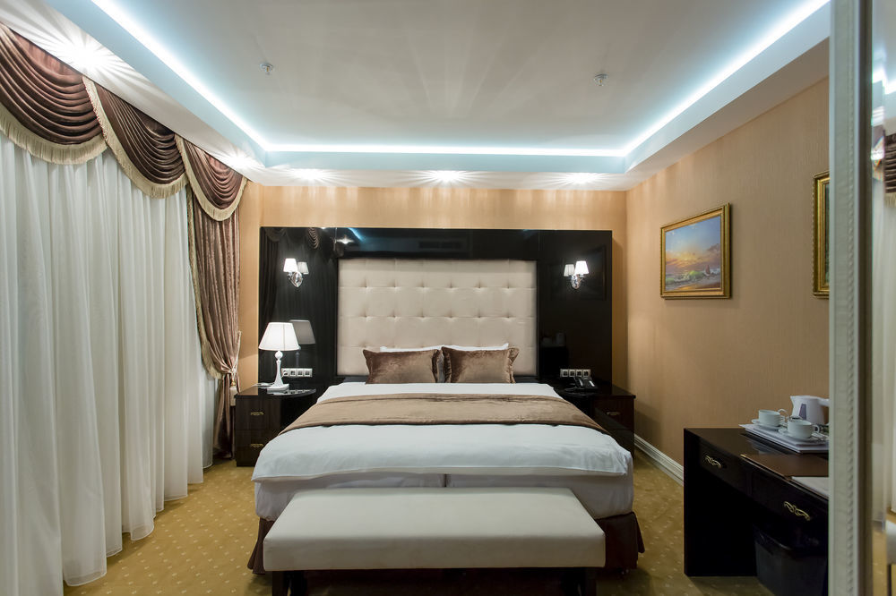 Boutique Hotel Buta Minsk Exterior photo A bedroom