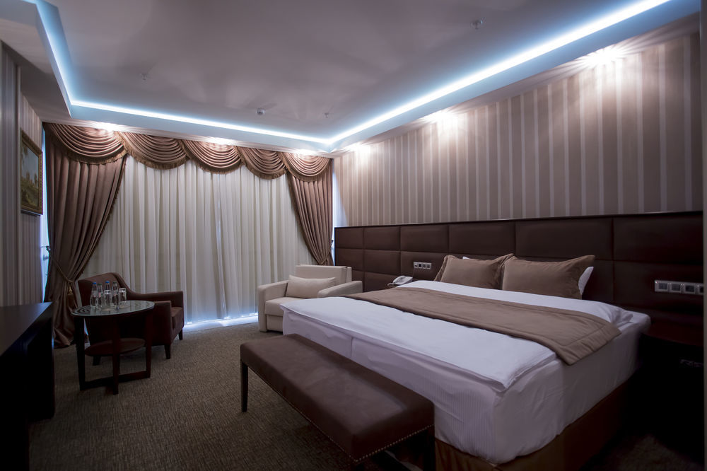 Boutique Hotel Buta Minsk Exterior photo A bedroom