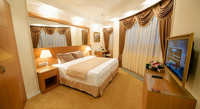 Boutique Hotel Buta Minsk Exterior photo A bedroom at the hotel