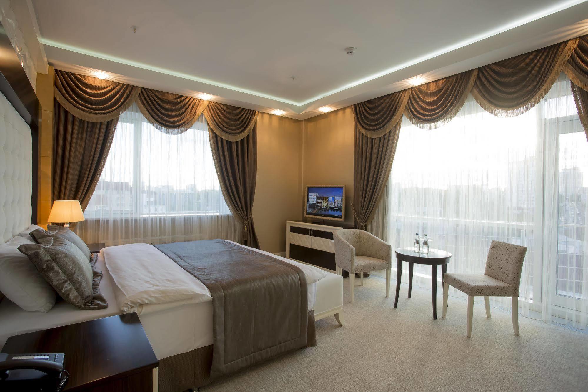 Boutique Hotel Buta Minsk Exterior photo A room at the hotel